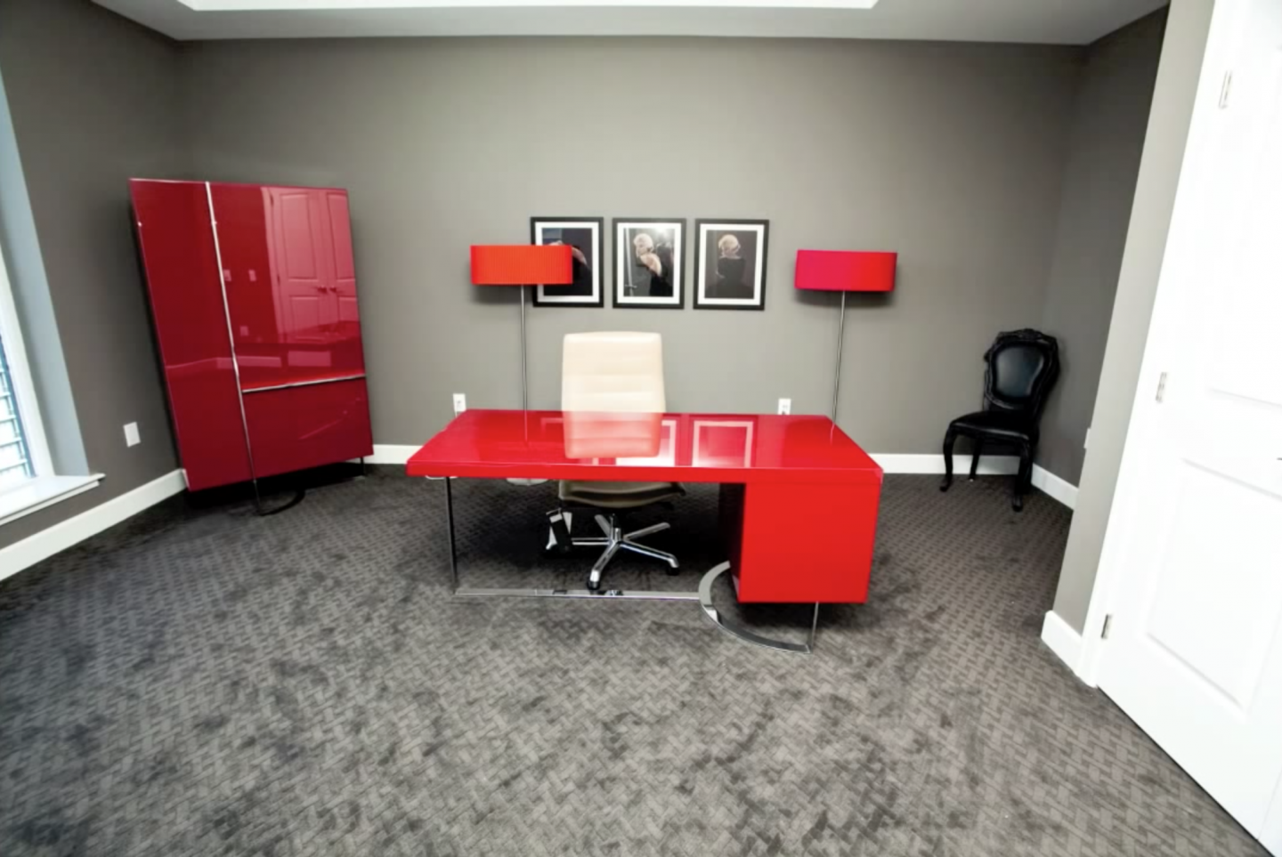 This red office does not count as a red room of pain, as depicted in E.L. James' Fifty Shades of Grey novel.