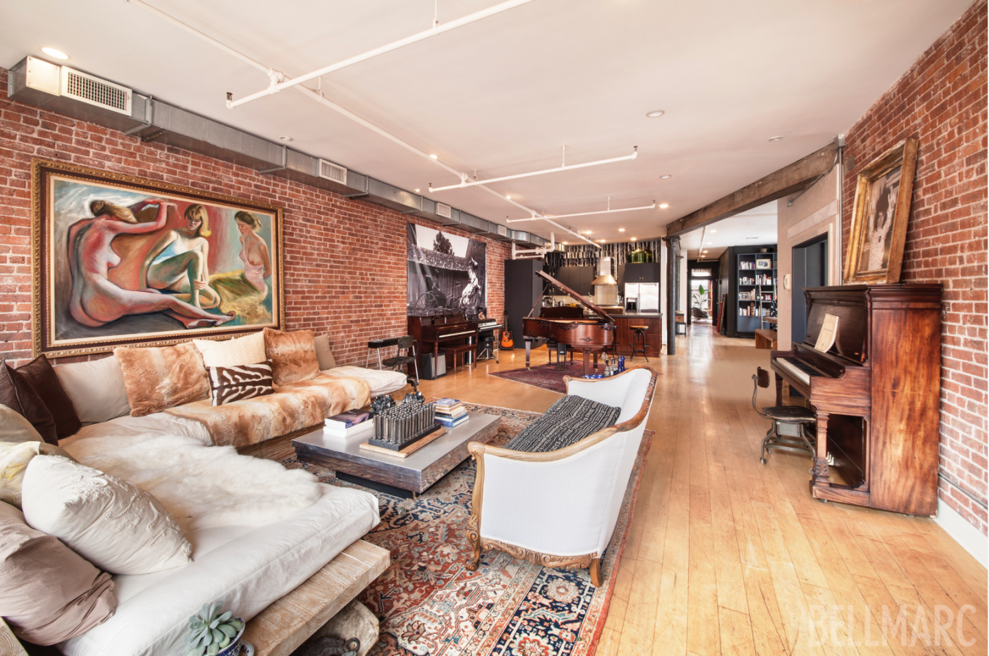 Carlton's rentable 2,500-square foot loft includes use of her two pianos. 