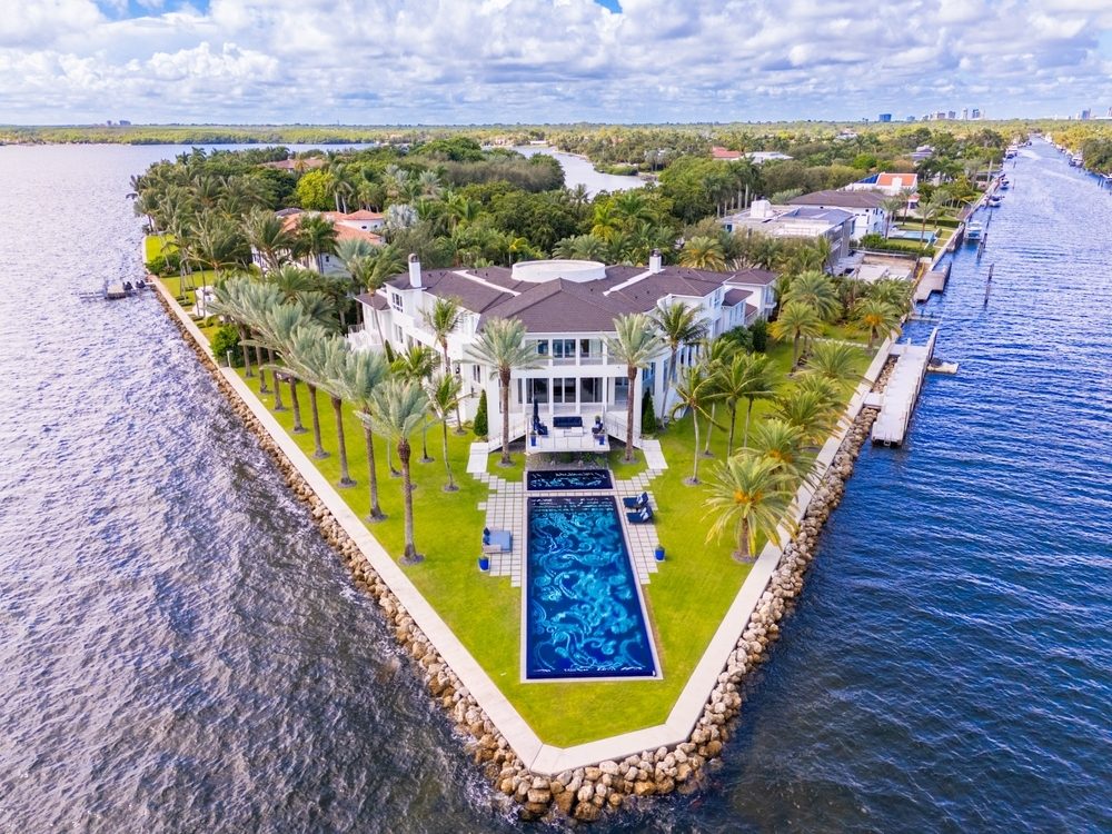 Coral Gables luxury waterfront neighborhood streetscape represented by HL Real Estate Group