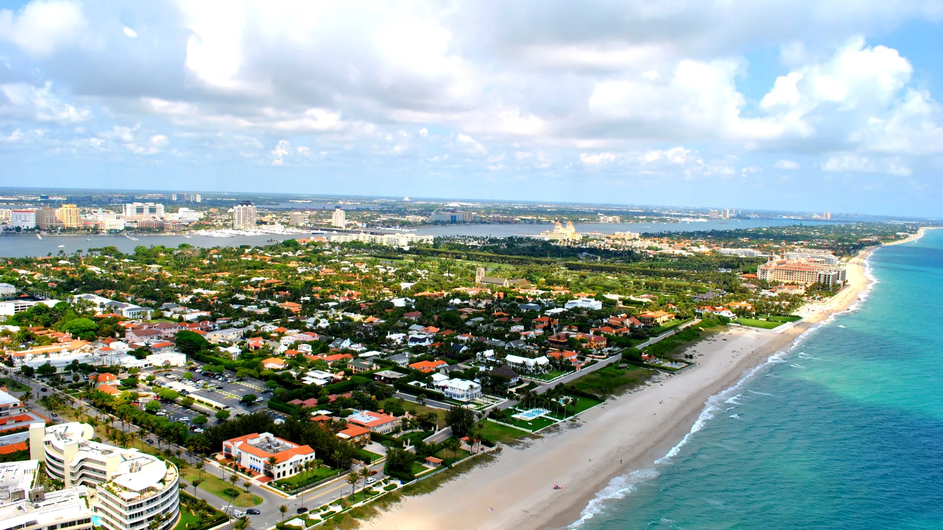 Aerial view of the Town of Palm Beach with the Atlantic oceanfront and Lake Worth Lagoon