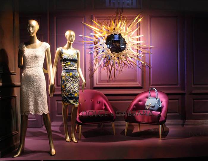 Koket's Guilt mirror and Nessa chairs on display at Saks Fifth Avenue