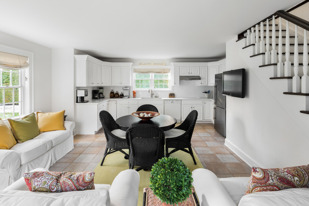 Dolly Lenz Presents A Charming DoubleGated Lushly Landscaped Estate