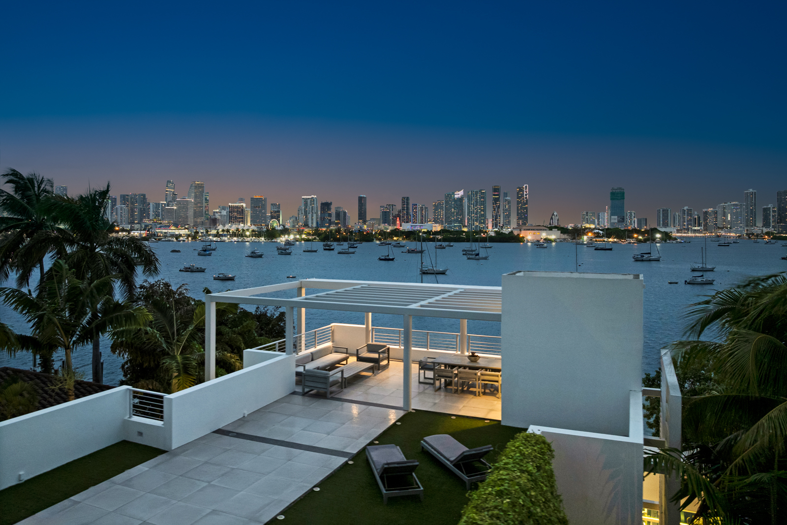 Waterfront terrace overlooking Miami's skyline